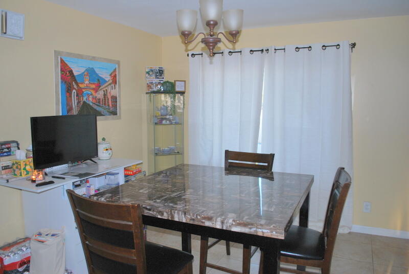 44561 Windsor Drive Indio, CA 92201 - Photo 10 of 22 a view of a dining room with furniture
