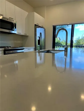 a view of living room with hardwood floor