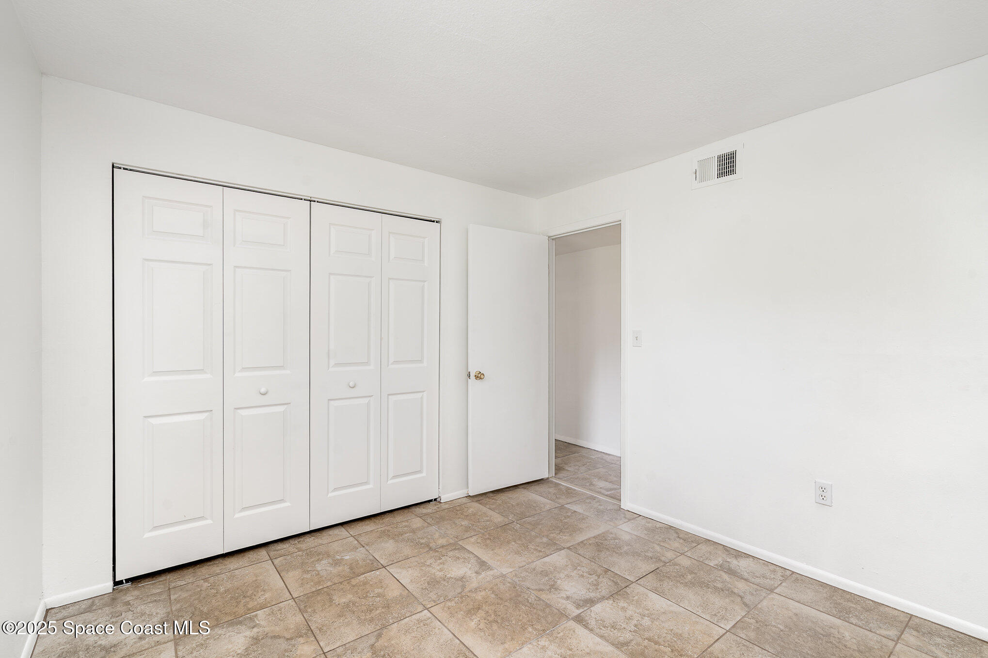 2219 Flower Tree Circle Melbourne, FL 32935 - Photo 18 of 26 a view of an empty room