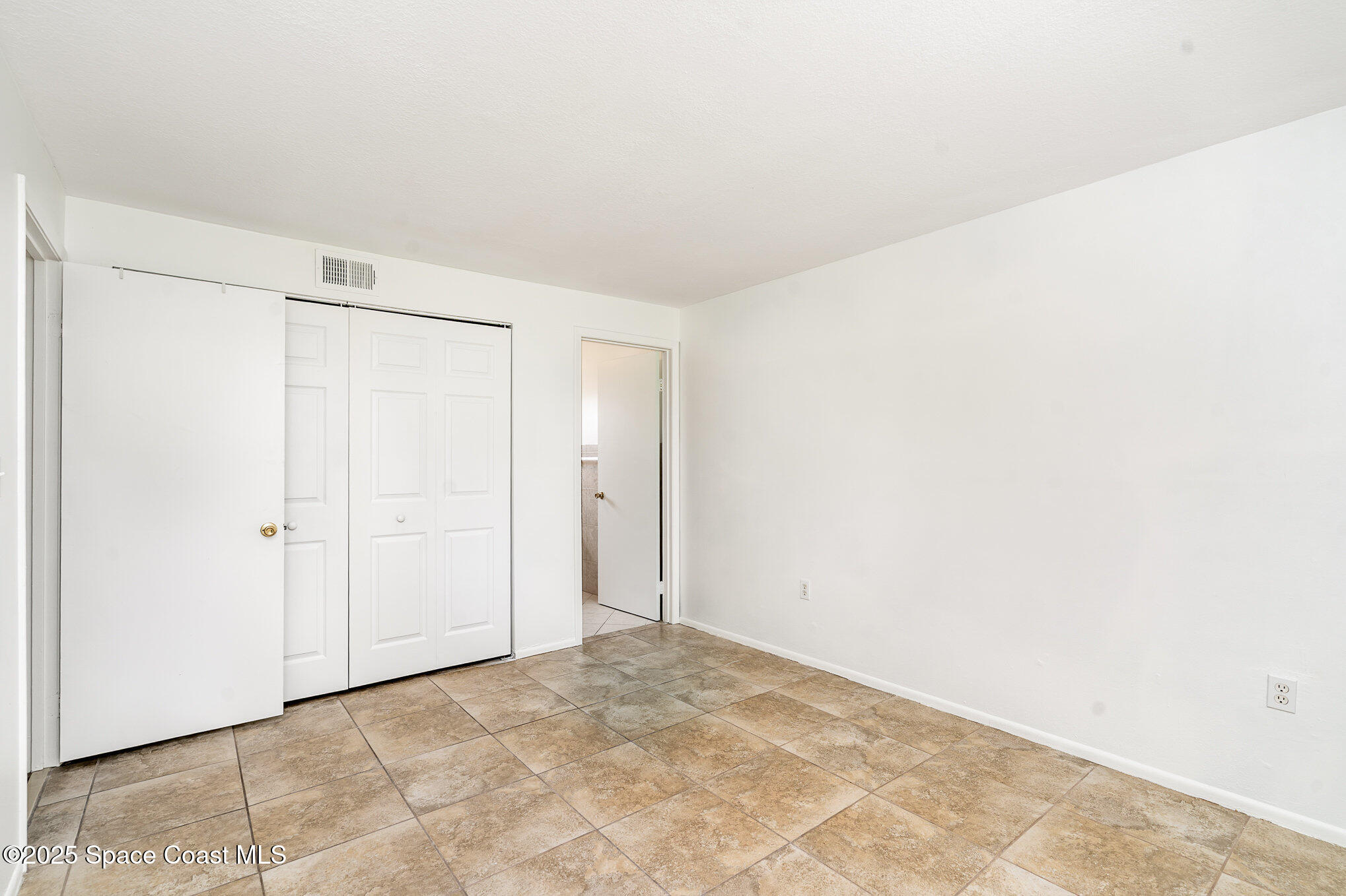 2219 Flower Tree Circle Melbourne, FL 32935 - Photo 23 of 26 a view of an empty room