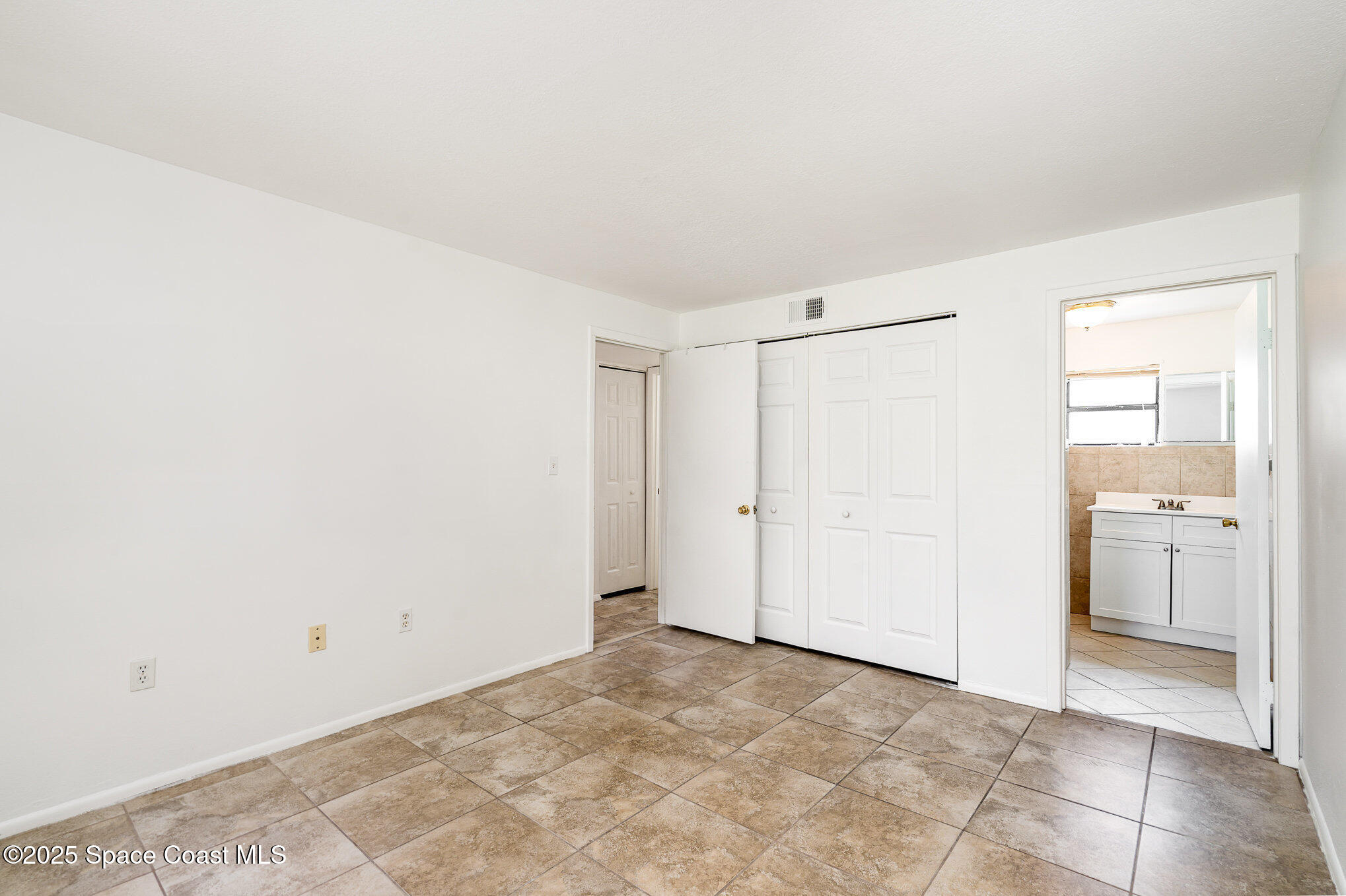 2219 Flower Tree Circle Melbourne, FL 32935 - Photo 24 of 26 a view of an empty room