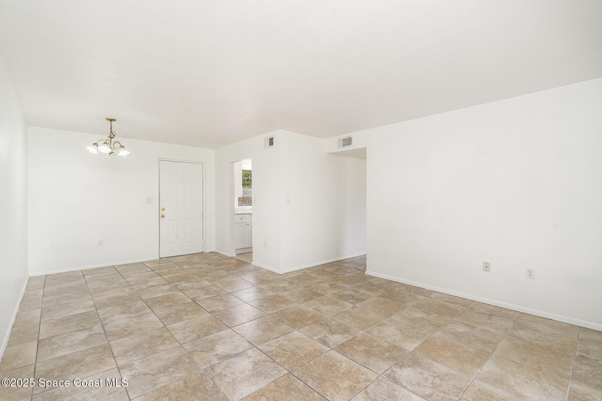 2219 Flower Tree Circle Melbourne, FL 32935 - Photo 9 of 26 a view of an empty room