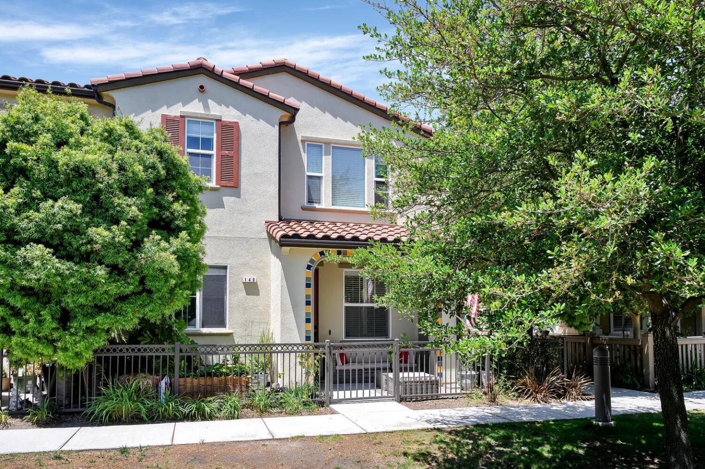 140 Larkspur Loop Morgan Hill, CA 95037 - Photo 1 of 28 a front view of a house with garden