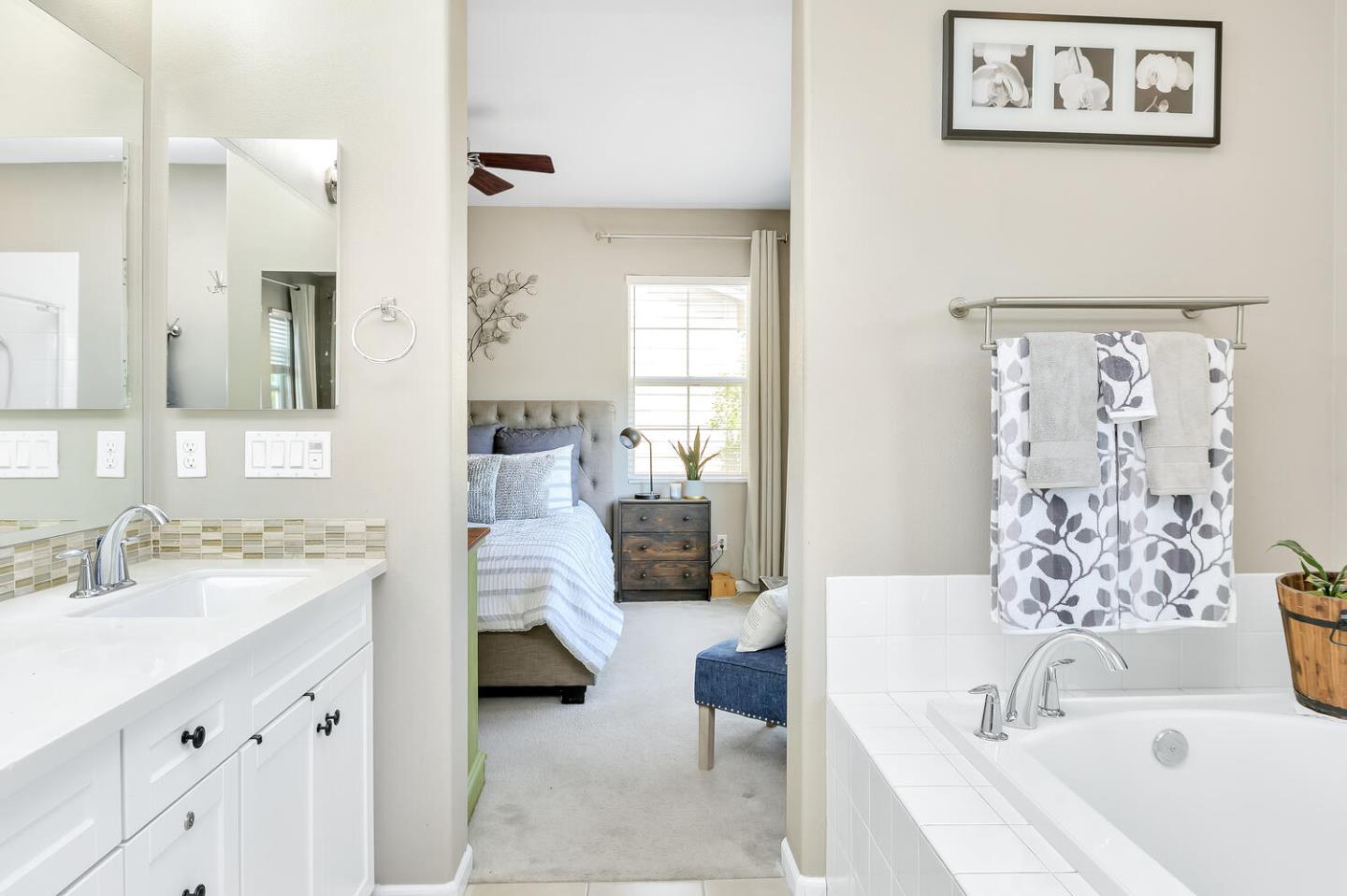 140 Larkspur Loop Morgan Hill, CA 95037 - Photo 20 of 28 a bathroom with a tub sink and mirror