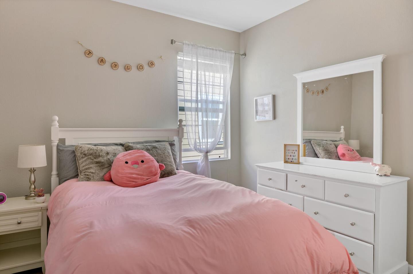 140 Larkspur Loop Morgan Hill, CA 95037 - Photo 23 of 28 a bedroom with a bed and a window