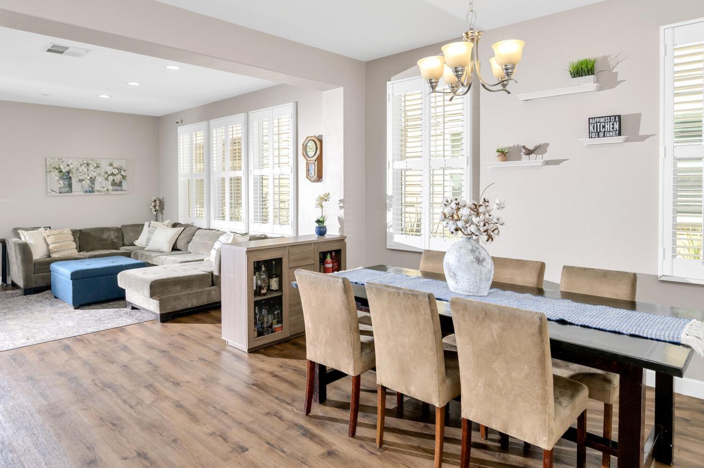 140 Larkspur Loop Morgan Hill, CA 95037 - Photo 7 of 28 a view of a dining room with furniture window and wooden floor