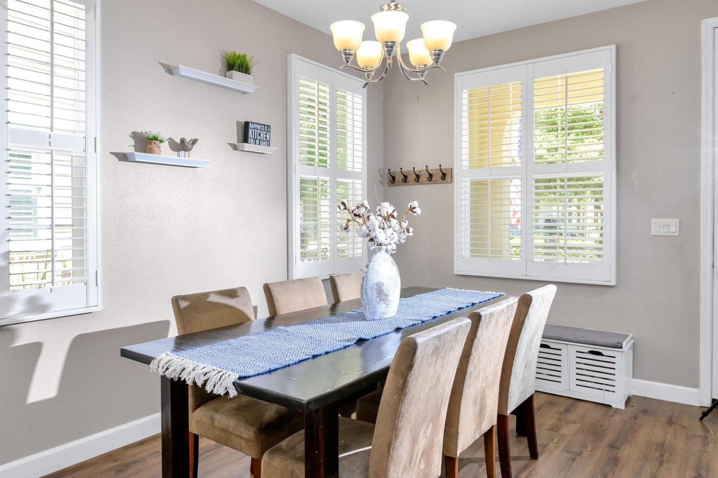 140 Larkspur Loop Morgan Hill, CA 95037 - Photo 8 of 28 a dining room with furniture and window