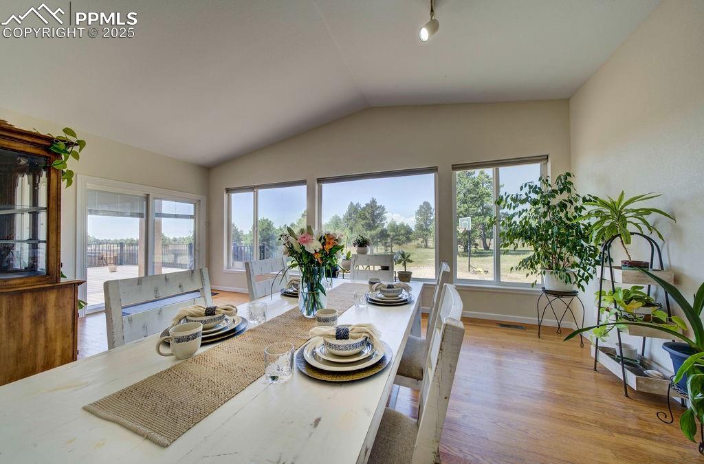 14650 Eastonville Road Elbert, CO 80106 - Photo 12 of 44 a living room with furniture and a large window