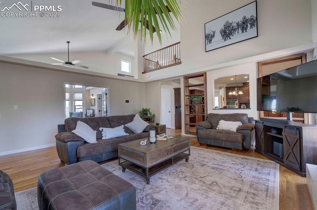 14650 Eastonville Road Elbert, CO 80106 - Photo 15 of 44 a living room with furniture and a fireplace