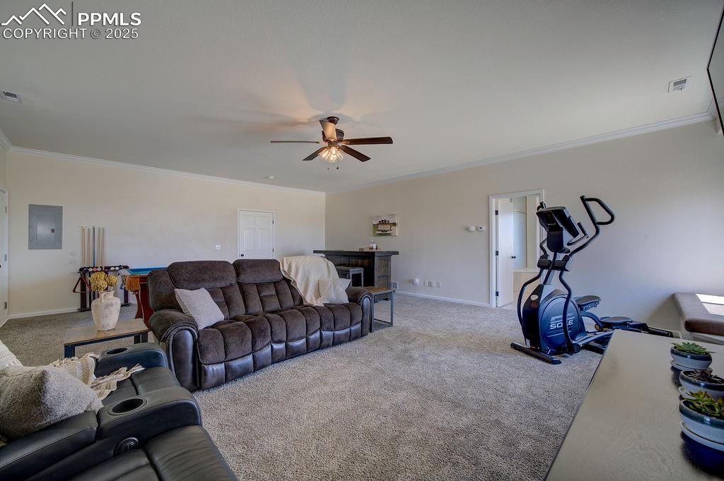 14650 Eastonville Road Elbert, CO 80106 - Photo 23 of 44 a living room with furniture a air conditioner and a window