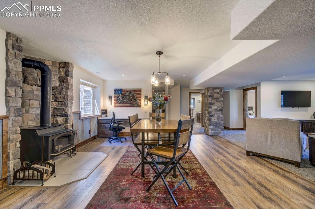 14650 Eastonville Road Elbert, CO 80106 - Photo 33 of 44 a living room with furniture and a chandelier