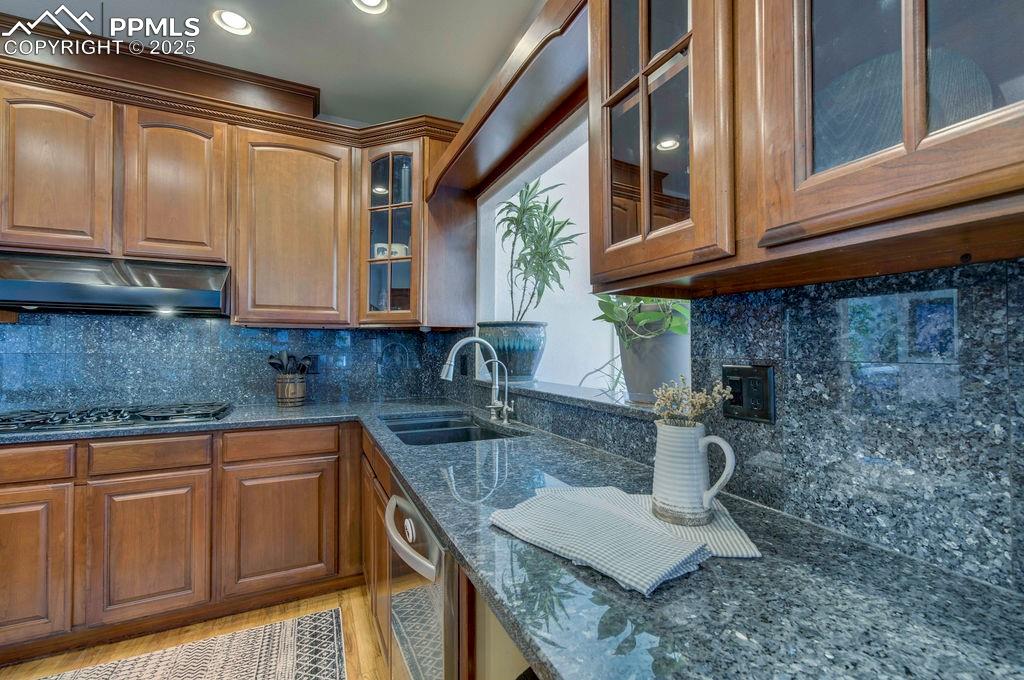 14650 Eastonville Road Elbert, CO 80106 - Photo 10 of 44 a kitchen with stainless steel appliances granite countertop a sink and cabinets