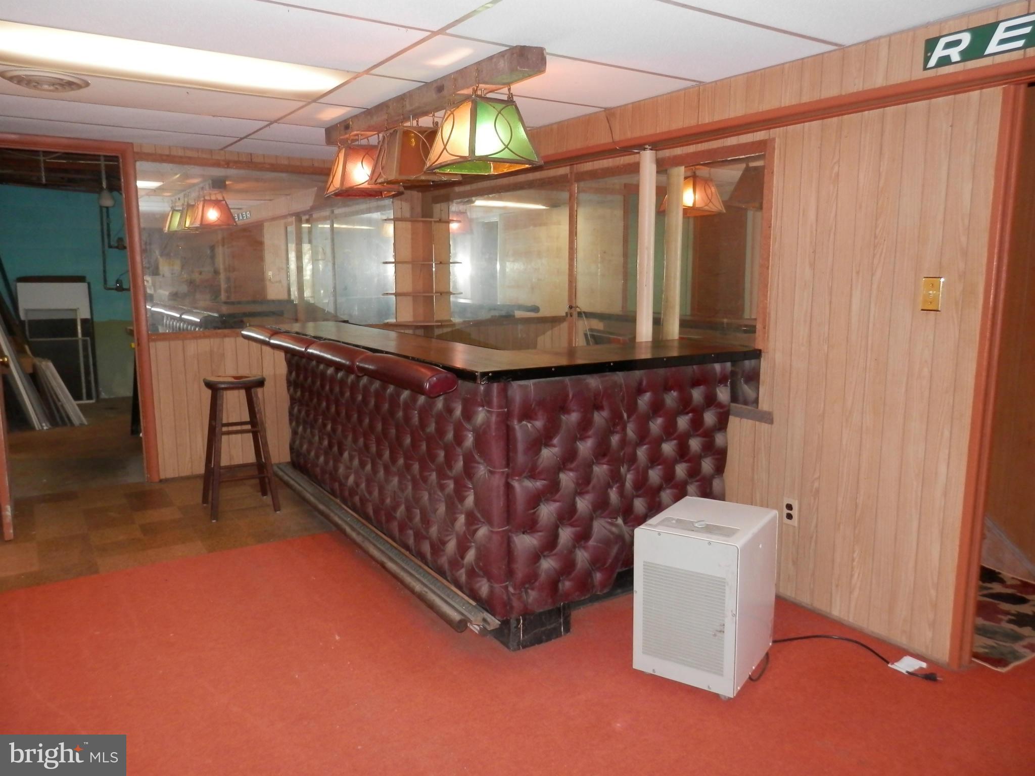 16800 Batchellors Forest Road Olney, MD 20832 - Photo 17 of 23 Basement bar/rec room