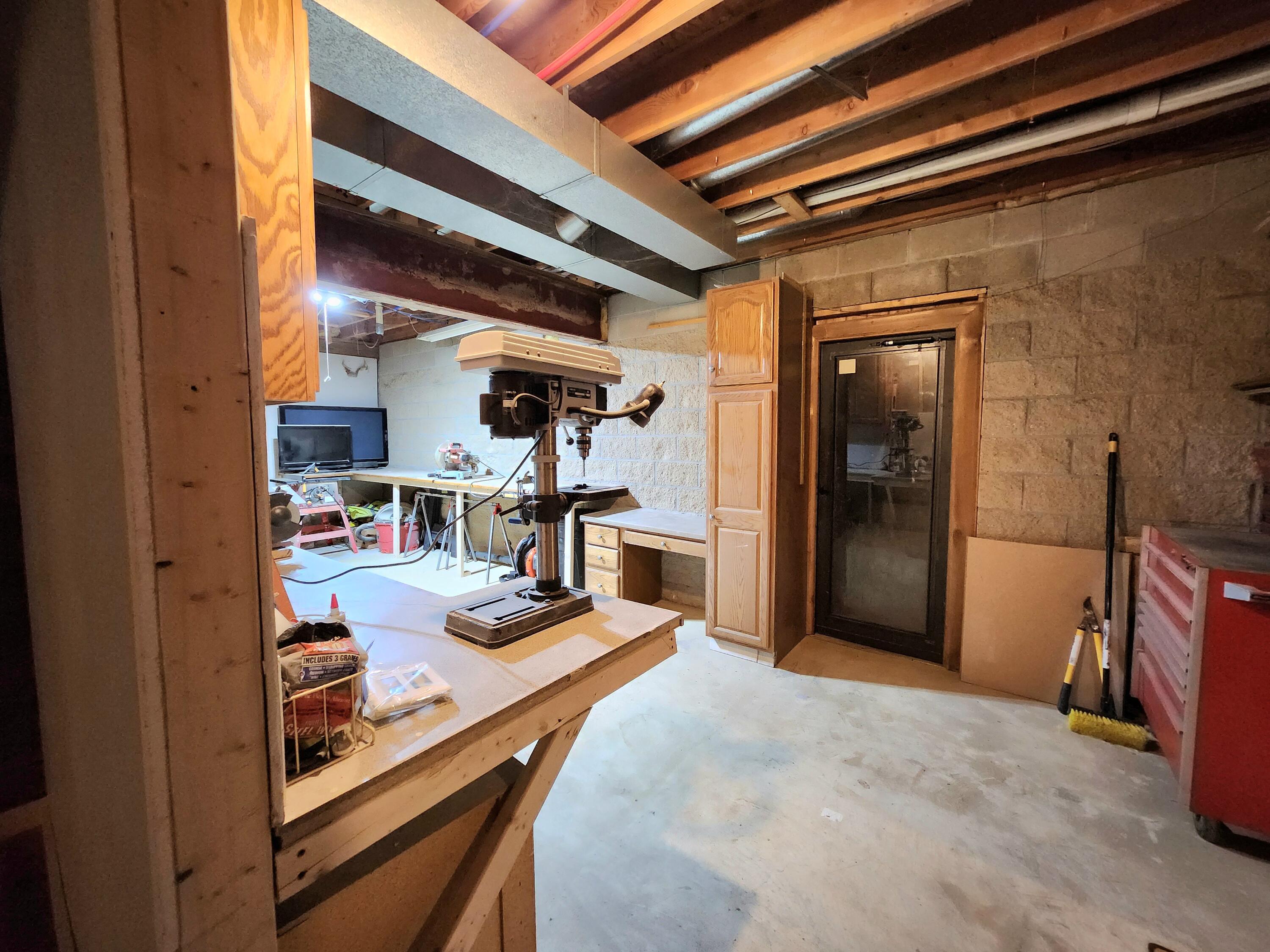 308 Brooks Road South Muskegon, MI 49442 - Photo 54 of 69 Main house basement work room