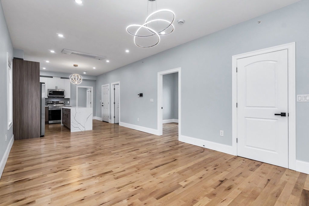 50 Maverick Street, Unit 3 Chelsea, MA 02150 - Photo 14 of 24 a view of a kitchen with a sink and a refrigerator