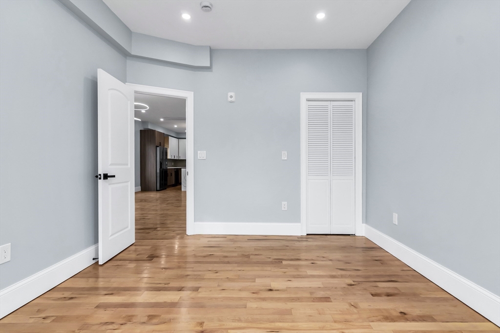 50 Maverick Street, Unit 3 Chelsea, MA 02150 - Photo 23 of 24 wooden floor in an empty room