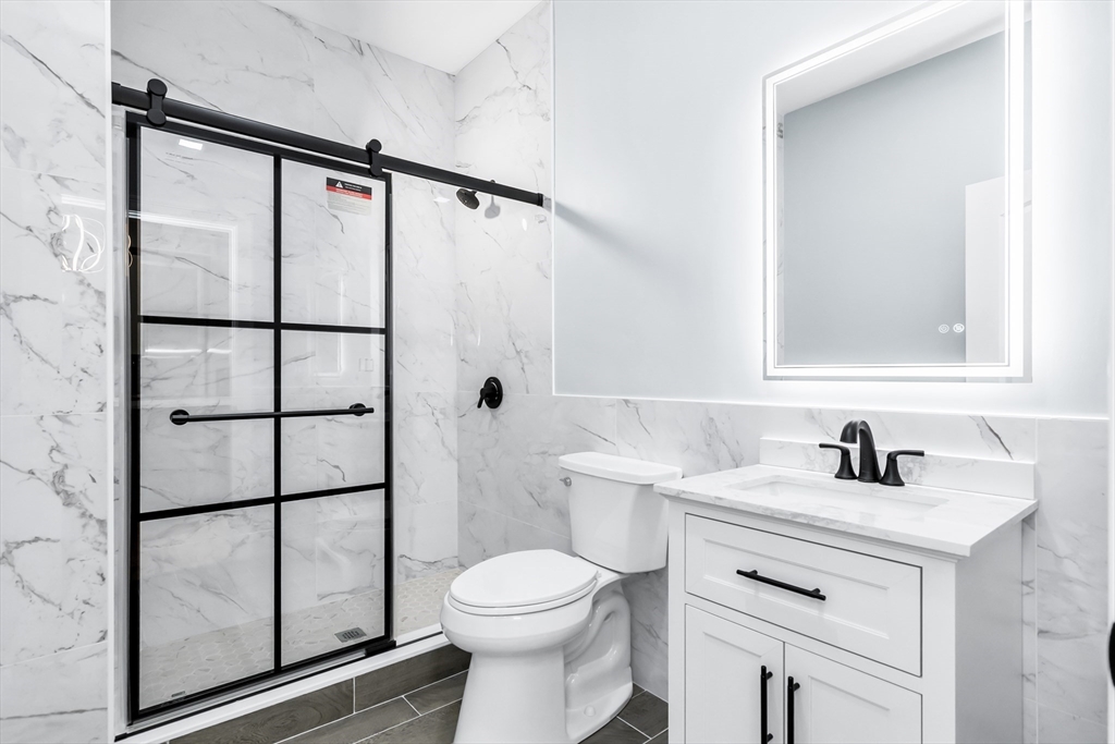 50 Maverick Street, Unit 3 Chelsea, MA 02150 - Photo 10 of 24 a bathroom with a sink toilet and shower