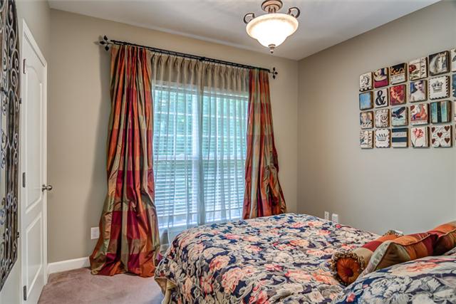 133 Ridgeview Trace Hendersonville, TN 37075 - Photo 12 of 20 The second bedroom is located on the main floor and is located on the opposite side of home from the Master. Could also be used for an office or nursery. The guest bathroom is located just outside and features a custom vanity.