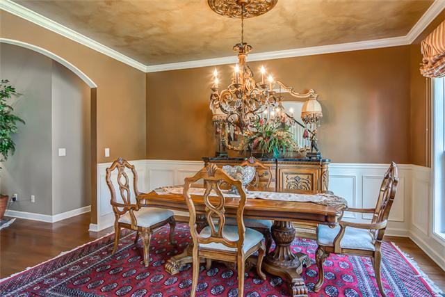 133 Ridgeview Trace Hendersonville, TN 37075 - Photo 4 of 20 The large dining room features wainscoting, custom faux-painted ceiling and beautiful chandelier with medallion which make for a classic dining experience.