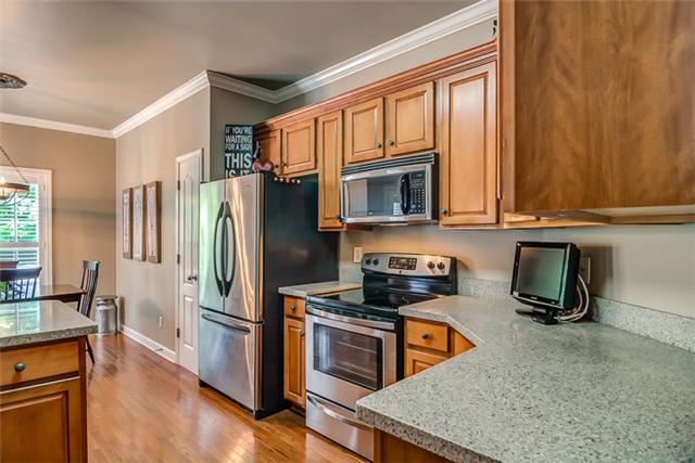 133 Ridgeview Trace Hendersonville, TN 37075 - Photo 7 of 20 The kitchen features stainless appliances, new updated faucets and solid surface counter tops.
