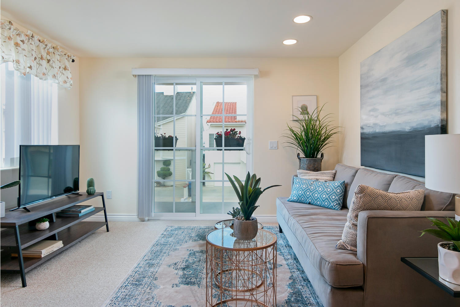 328 Lakeshore Drive Oxnard, CA 93035 - Photo 14 of 43 a living room with furniture potted plant and a window