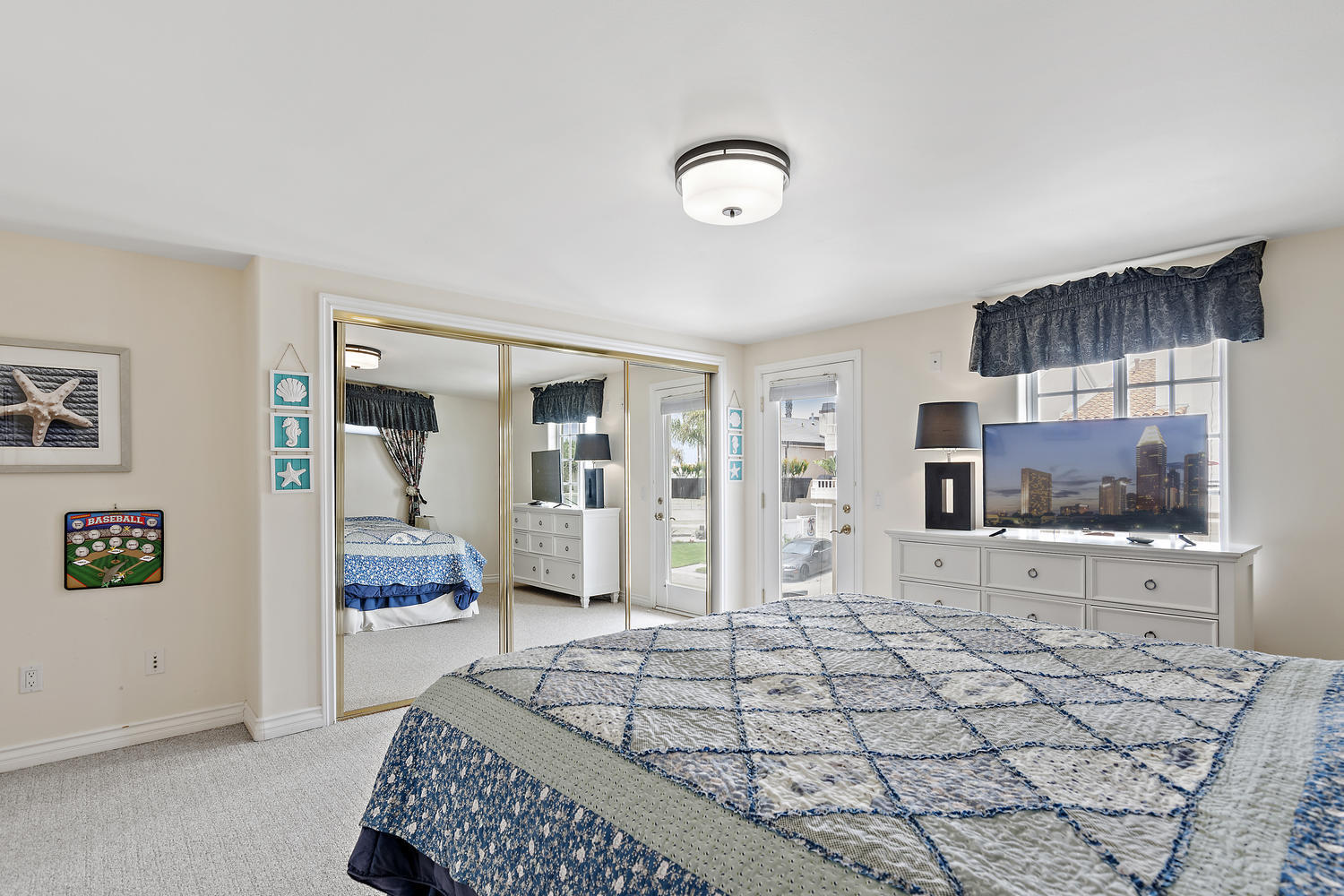 328 Lakeshore Drive Oxnard, CA 93035 - Photo 16 of 43 a bedroom with a bed and a flat screen tv