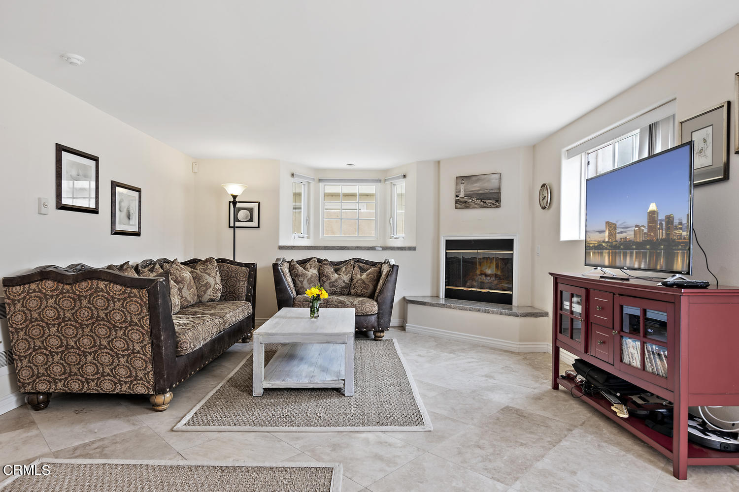 328 Lakeshore Drive Oxnard, CA 93035 - Photo 20 of 43 a living room with furniture and a fireplace