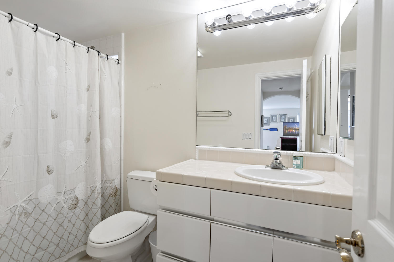 328 Lakeshore Drive Oxnard, CA 93035 - Photo 23 of 43 a bathroom with a sink toilet and shower