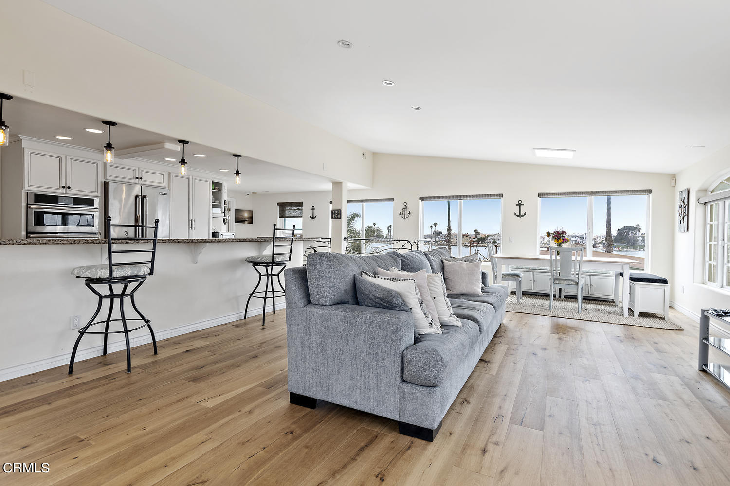 328 Lakeshore Drive Oxnard, CA 93035 - Photo 5 of 43 a living room with furniture and a wooden floor