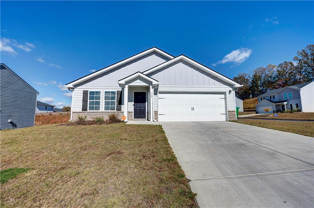 500 Pemberton Street Kingston, GA 30145 - Photo 1 of 46 a view of a house with a yard and garage