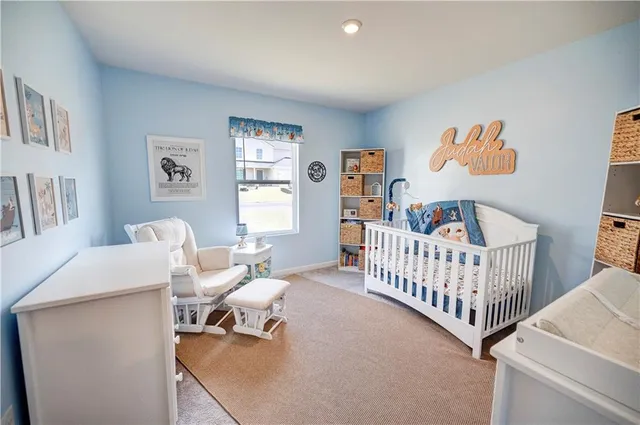 a bedroom with furniture and a window