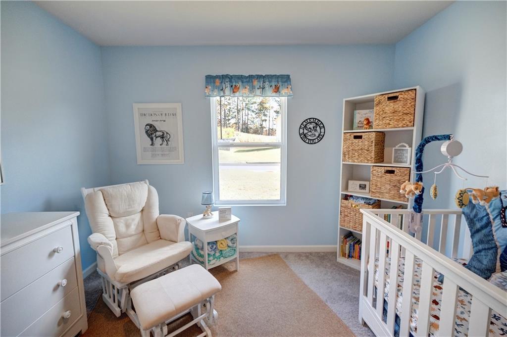 500 Pemberton Street Kingston, GA 30145 - Photo 19 of 46 a living room with furniture and a window