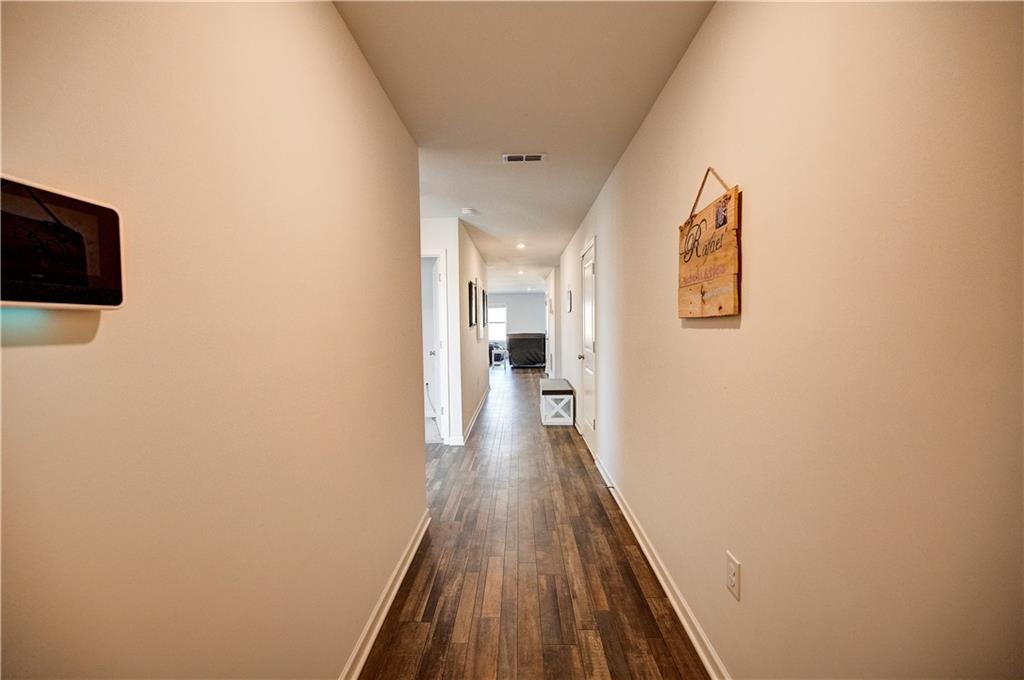 500 Pemberton Street Kingston, GA 30145 - Photo 2 of 46 a view of a hallway with wooden floor and staircase