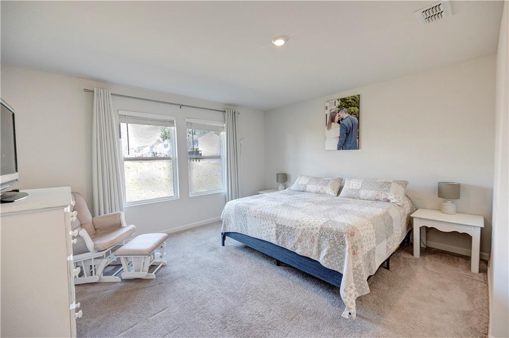 500 Pemberton Street Kingston, GA 30145 - Photo 25 of 46 a bedroom with a bed and a window