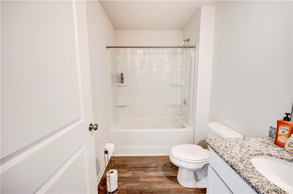 500 Pemberton Street Kingston, GA 30145 - Photo 5 of 46 a bathroom with a sink toilet and shower