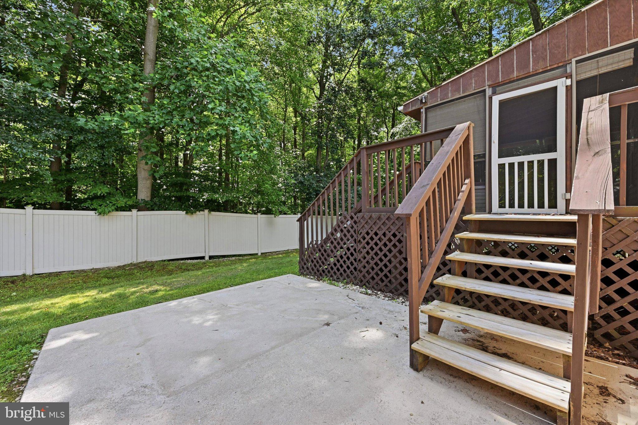 915 Rue Madora Bear, DE 19701 - Photo 5 of 14 Serene backyard retreat awaits you.