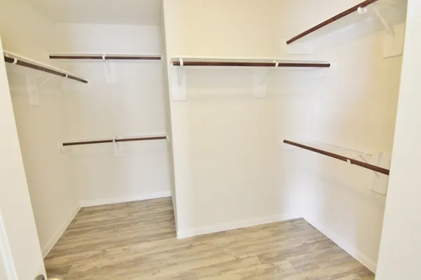 a view of an empty walk in closet