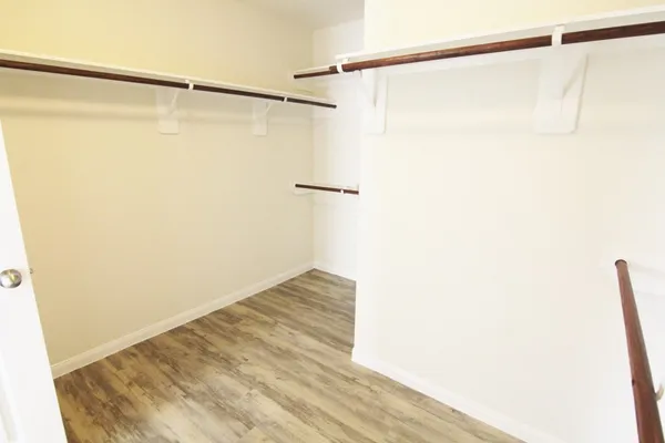 a view of small space with wooden floor