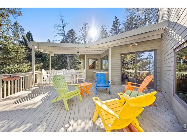 swimming pool view with a seating space