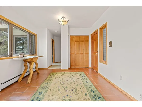 a view of a livingroom with furniture and window