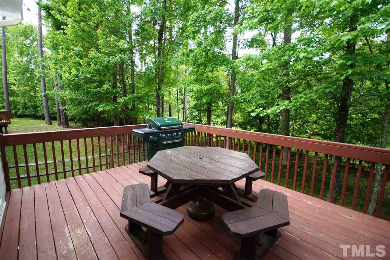 9241 Shallcross Way Raleigh, NC 27617 - Photo 20 of 22 a view of a deck with furniture