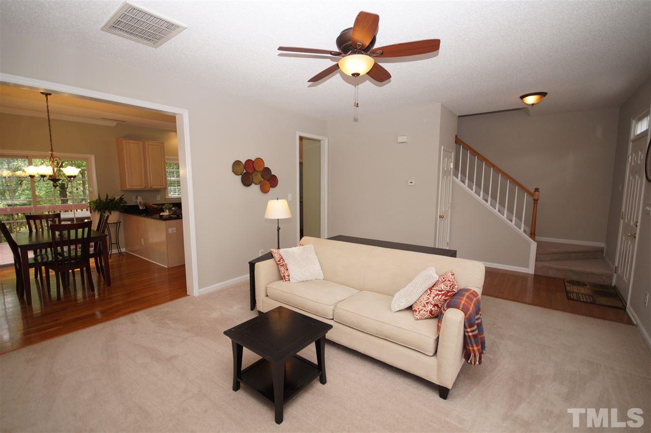 9241 Shallcross Way Raleigh, NC 27617 - Photo 7 of 22 a living room with furniture