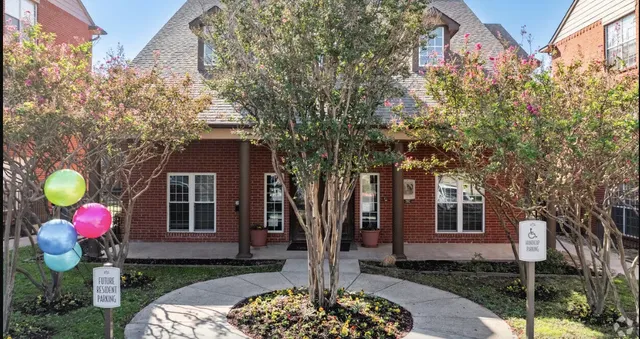 a front view of a house with yard