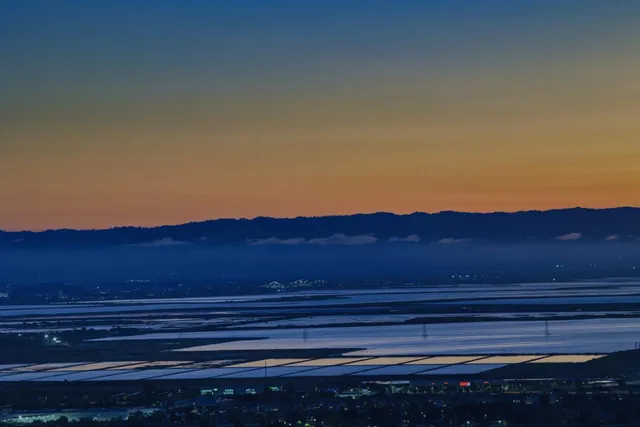 a view of city and mountain