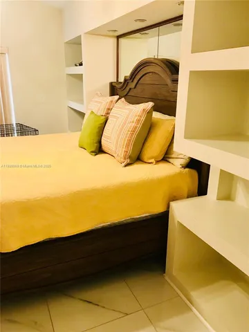 a bathroom with a sink and mirror