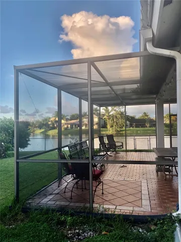 a view of a lake with a big yard