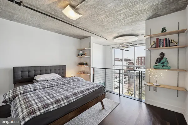a bathroom with a shower sink and mirror