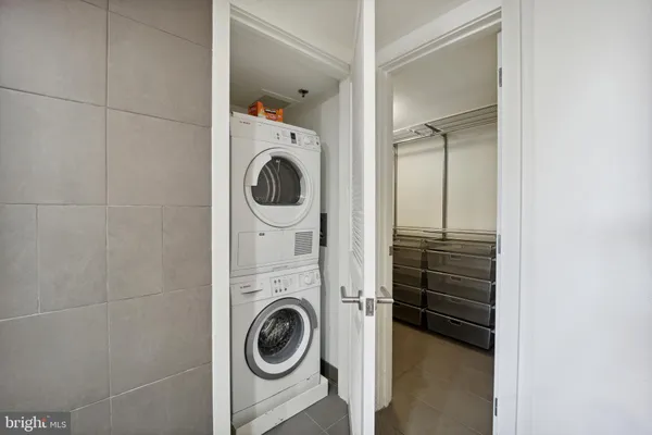 a bathroom with a large tub and shower