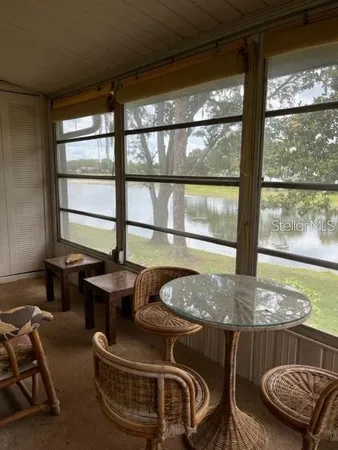 a room with furniture and window