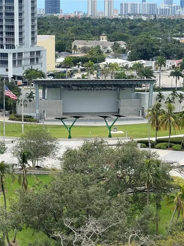 a view of a city with a lake